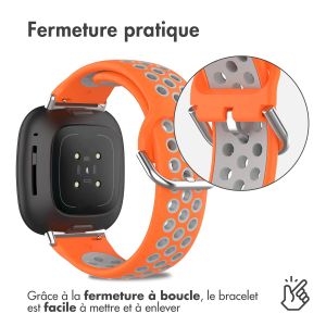 iMoshion Bracelet sportif en silicone Fitbit Versa 4 / 3 / Sense (2) - Orange/Gris