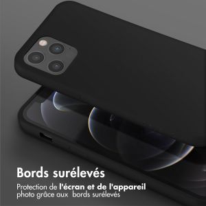 Selencia Coque silicone avec cordon amovible iPhone 12 (Pro) - Noir